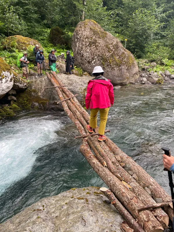 Crossing The River At Tobavarchkhili Lakes Tobavarchkhili lakes trek – Guided tour from Kutaisi